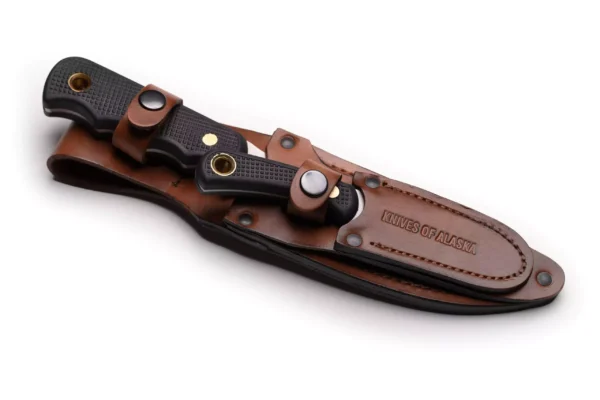 Knives of Alaska Bush Camp and Muskrat combo with Suregrip handles in leather sheath