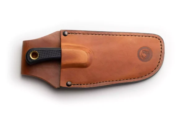 Knives of Alaska Caribou knife inside leather sheath with black Suregrip handle visible