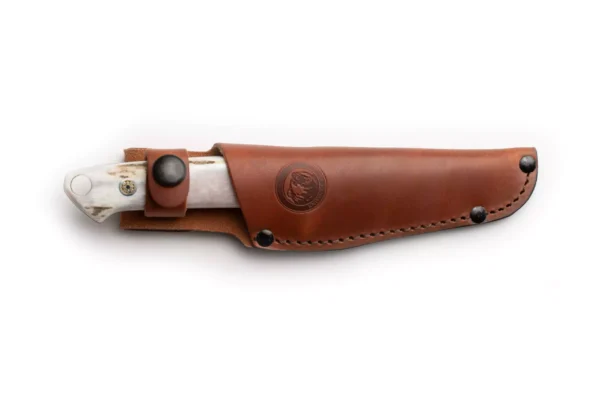 The Legacy knife with stag handle secured in brown leather sheath